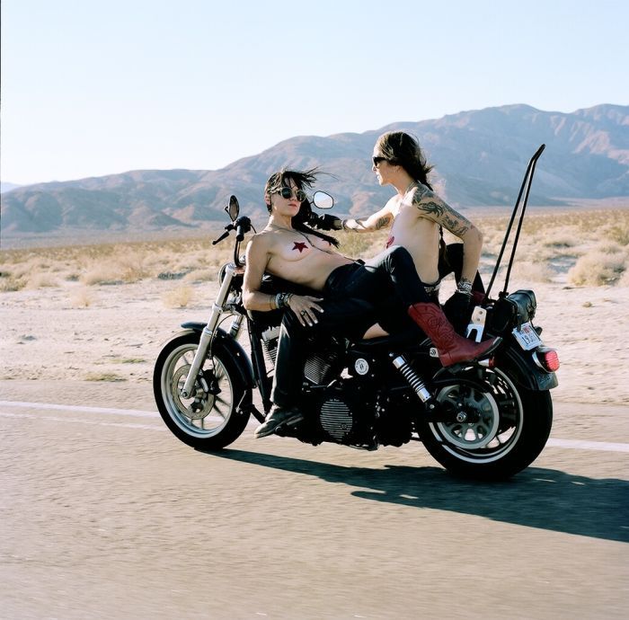 Girls on a motorcycle in Ibage