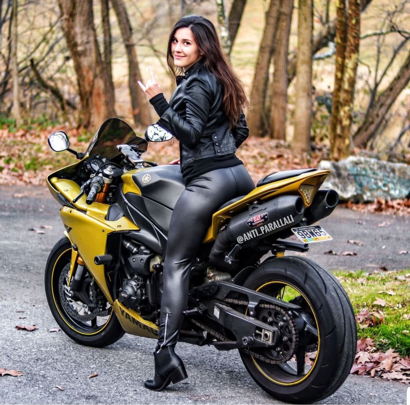 Sexy girl Brunettes on a motorcycle in Ibage