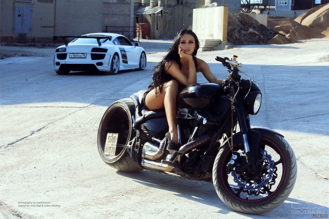 Sexy model Brunettes on a motorcycle in Ibage